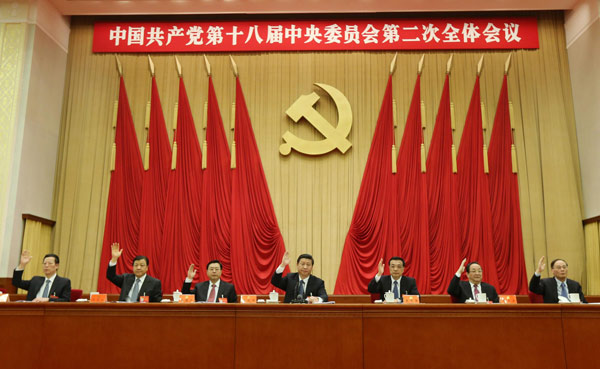 Xi Jinping (C), Li Keqiang (3rd R), Zhang Dejiang (3rd L), Yu Zhengsheng (2nd R), Liu Yunshan (2nd L), Wang Qishan (1st R) and Zhang Gaoli (1st L) attend the second plenary session of the 18th Central Committee of the Communist Party of China (CPC) at the Great Hall of the People in Beijing, capital of China, Feb 28, 2013. The session lasted from Feb 26 to 28. [Photo/Xinhua]