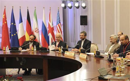 Members of the Iranian delegation, led by Supreme National Security Council Secretary and chief nuclear negotiator Saeed Jalili (2nd R), sit at a table during talks in Almaty February 26, 2013. [cntv.cn]