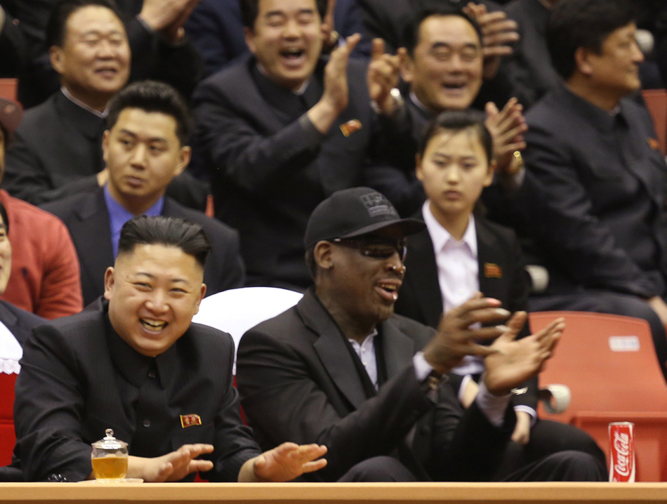 North Korean leader Kim Jong Un (left) and former NBA star Dennis Rodman watch North Korean and U.S. players in an exhibition basketball game at an arena in Pyongyang, North Korea, Thursday, Feb. 28, 2013. 