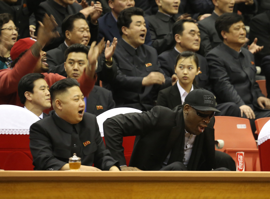 North Korean leader Kim Jong Un (left) and former NBA star Dennis Rodman watch North Korean and U.S. players in an exhibition basketball game at an arena in Pyongyang, North Korea, Thursday, Feb. 28, 2013. 