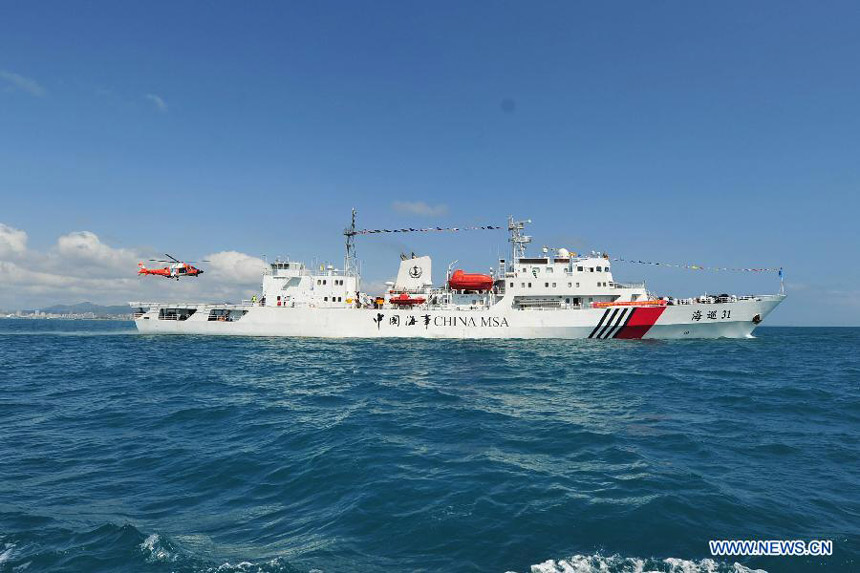 Marine patrol ship &apos;Haixun 31&apos; sails out of the port of Sanya, south China&apos;s Hainan Province, Feb. 28, 2013.