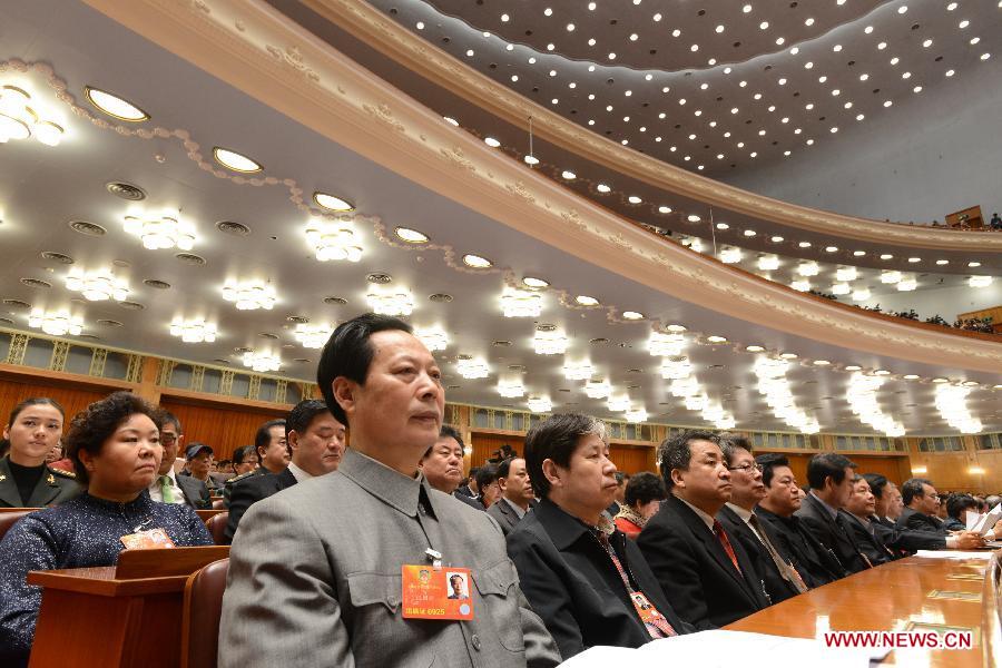 Members of the 12th National Committee of the Chinese People's Political Consultative Conference (CPPCC) attend the opening meeting of the first session of the 12th CPPCC National Committee at the Great Hall of the People in Beijing, capital of China, March 3, 2013.