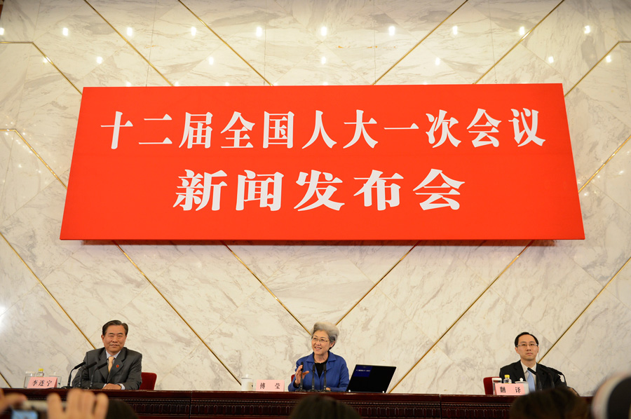 Fu Ying, Vice Foreign Minister and spokesperson for the First Session of the 12th NPC, answers questions from journalists during the press conference. 