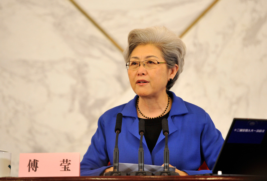 Fu Ying, Vice Foreign Minister and spokesperson for the First Session of the 12th NPC, answers questions from journalists during the press conference.[Photo/Xinhua]
