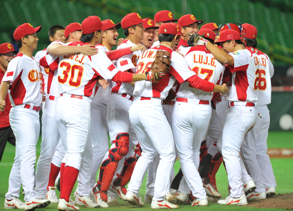 China's players celebrate defeating Brazil at the World Baseball Classic yesterday in Fukuoka, Japan on March 5, 2013. 