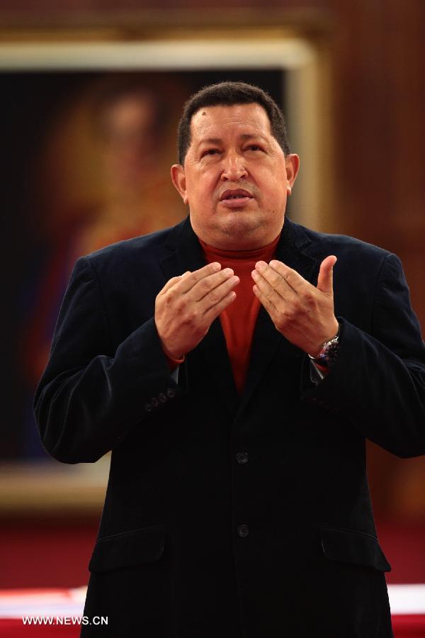 Image provided by the Presidency of Venezuela on Sept. 4, 2012 shows President Hugo Chavez participating in the delivery of aid in petro-orinco bonds to beneficiaries of basic and secondary education at the Palace of Miraflores, Caracas, capital of Venezuela. Venezuelan President Hugo Chavez died on March 5, 2013 at 16:25 (local time), according to nationally broadcast message by Venezuelan Vice President Nicolas Maduro. 