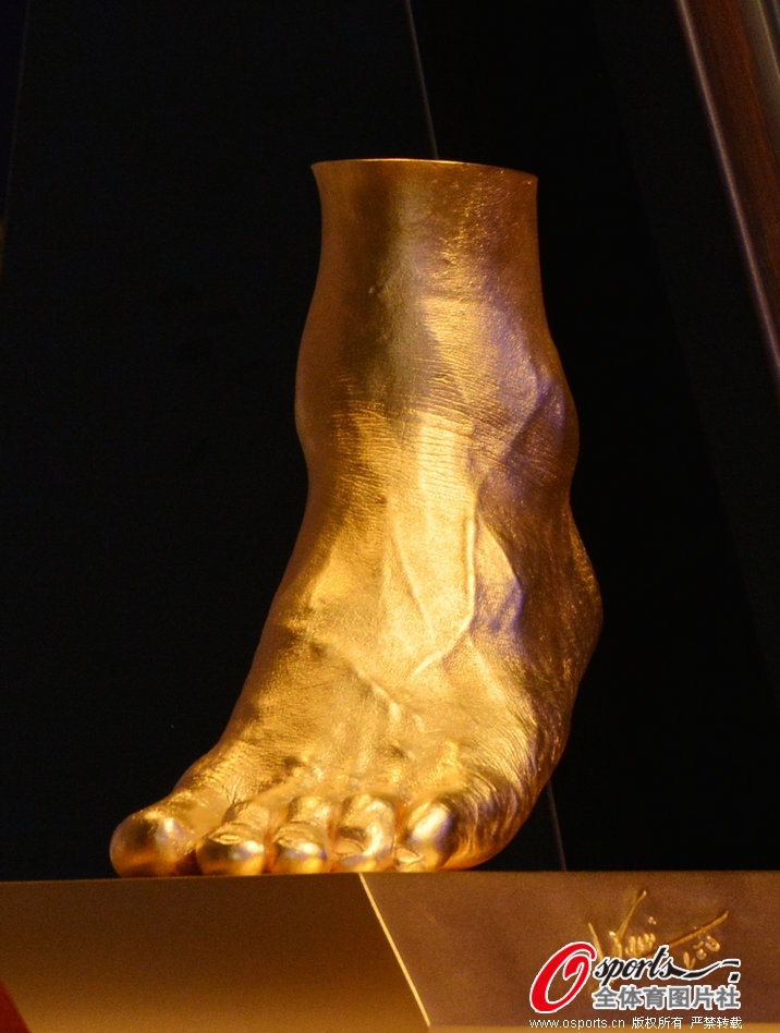 A pure gold replica of Leo Messi's left foot.