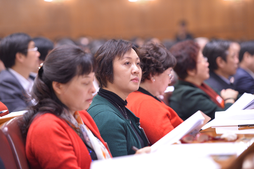 The third plenary meeting of the first session of the 12th National Committee of the Chinese People&apos;s Political Consultative Conference (CPPCC) at the Great Hall of the People in Beijing, capital of China, March 8, 2013. In the picture, CPPCC women members attend the meeting. 