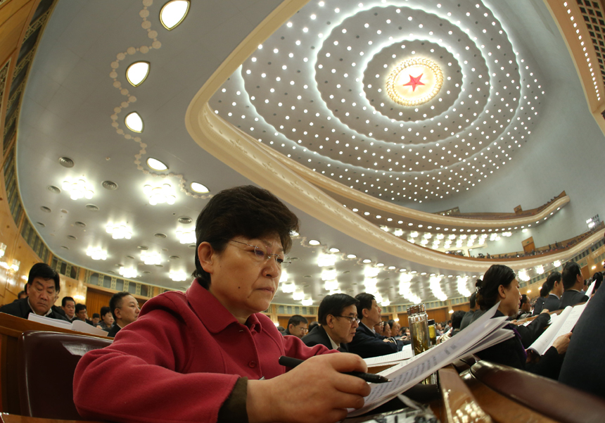 The third plenary meeting of the first session of the 12th National Committee of the Chinese People&apos;s Political Consultative Conference (CPPCC) at the Great Hall of the People in Beijing, capital of China, March 8, 2013. In the picture, CPPCC member Shen Suli attends the meeting. 