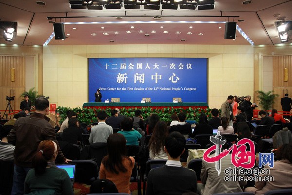 A press conference is held by the first session of the 12th National People&apos;s Congress (NPC) in Beijing, capital of China, March 8, 2013. Chinese Minister of Commerce Chen Deming answers questions at the press conference.