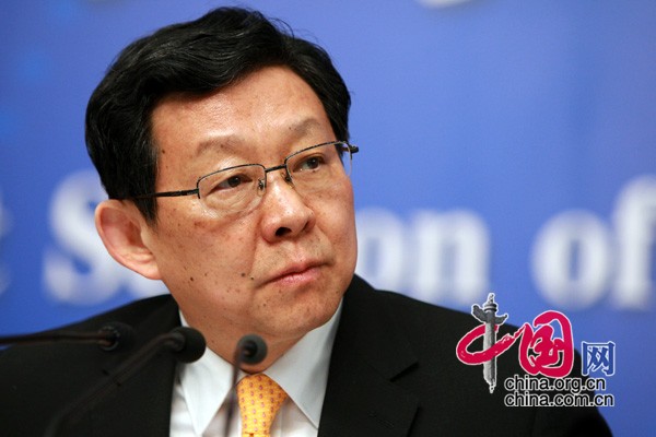 A press conference is held by the first session of the 12th National People&apos;s Congress (NPC) in Beijing on March 8, 2013. Chinese Minister of Commerce Chen Deming answers questions at the press conference.