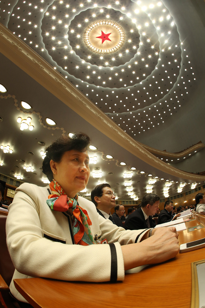 The third plenary meeting of the first session of the 12th National Committee of the Chinese People&apos;s Political Consultative Conference (CPPCC) is held at the Great Hall of the People in Beijing on March 8, 2013. In the picture, CPPCC member Chen Zijiang attends the meeting. 