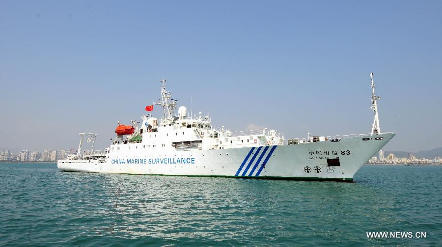 China Marine Surveillance ship Haijian 83 sets off from Sanya harbor of south China's Hainan Province, March 8, 2013. 