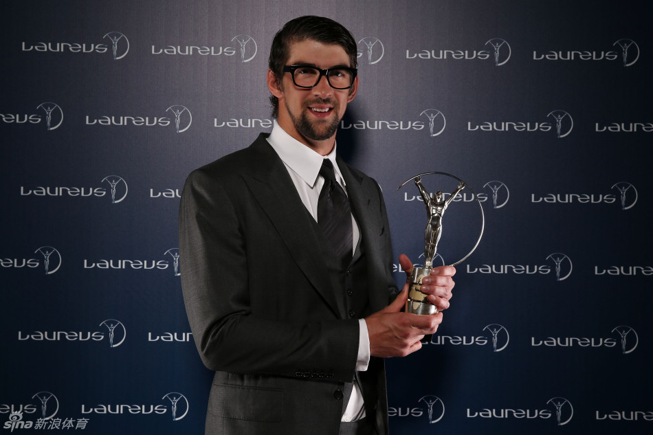 Michael Phelps is presented with a new Award - the Laureus Academy Exceptional Achievement Award. 