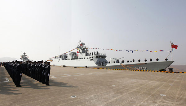 The Chinese Navy held a commissioning ceremony for the frigate Bengbu in Zhoushan, Zhejiang province, March 12, 2013. The Chinese-developed next-generation stealth frigate was commissioned to the People's Liberation Army Navy (PLA Navy) on Tuesday. [Photo/Xinhua]