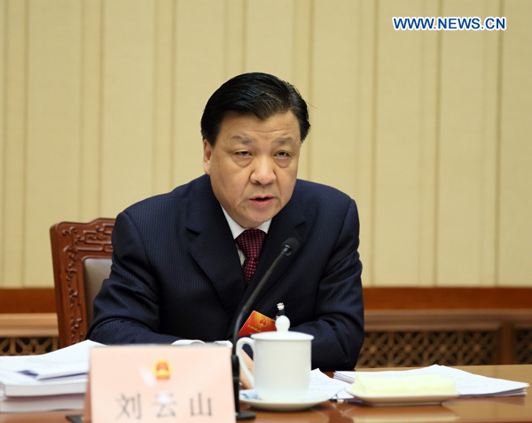 Liu Yunshan, executive chairperson of the presidium of the first session of the 12th National People's Congress (NPC), speaks at the third meeting of the presidium at the Great Hall of the People in Beijing, capital of China, March 12, 2013.[Xinhua]