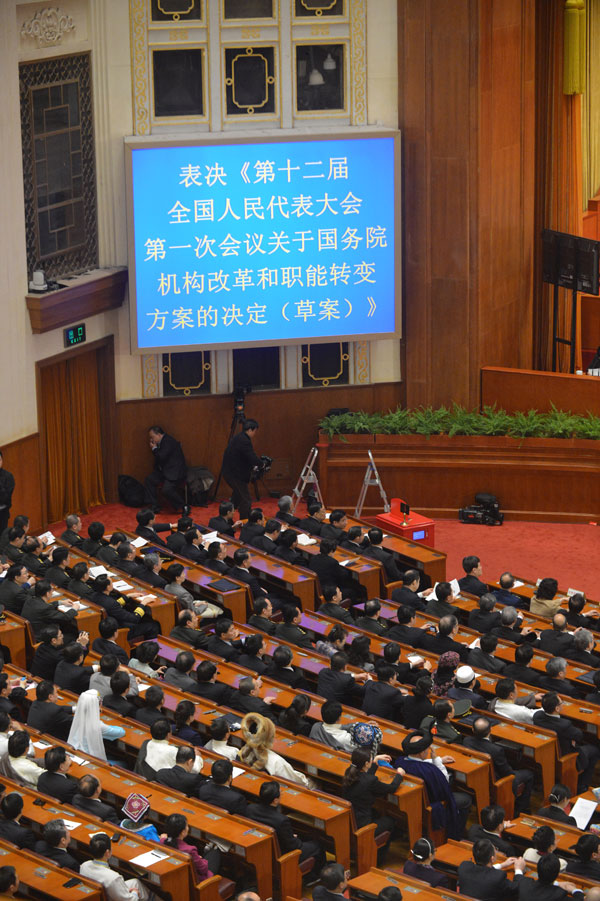 The fourth plenary meeting of the first session of the 12th National People's Congress (NPC) is held at the Great Hall of the People in Beijing, capital of China, March 14, 2013. 