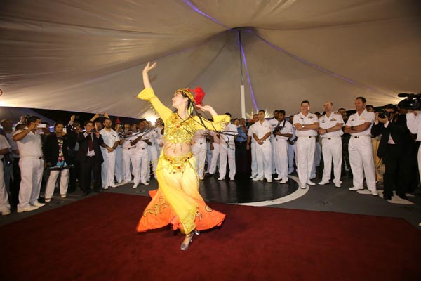 Kong Xiangyun performs a Xinjiang folk dance during the 'Aman13' International Naval Exercise in Karachi, Pakistan. [Photo by Wang Changsong]