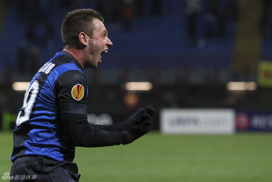 Antonio Cassano looks delighted after his free-kick deflects off Williams Gallas for the third goal.