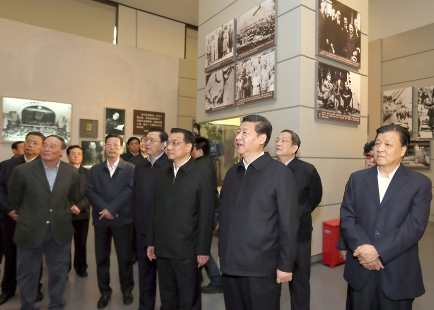 Xi Jinping (2nd R, front), general secretary of the Communist Party of China (CPC) Central Committee and chairman of the CPC Central Military Commission (CMC), views 'The Road Toward Renewal' exhibition along with other members of the Standing Committee of Political Bureau of the CPC Central Committee including Li Keqiang (3rd R, front), Zhang Dejiang (4th R, front), Yu Zhengsheng (2nd R, back), Liu Yunshan (1st R, front), Wang Qishan (1st L, front) and Zhang Gaoli (2nd L, front) at the National Museum of China in Beijing, capital of China, Nov. 29, 2012.