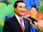 New Chinese FM vows to work for harmonious world