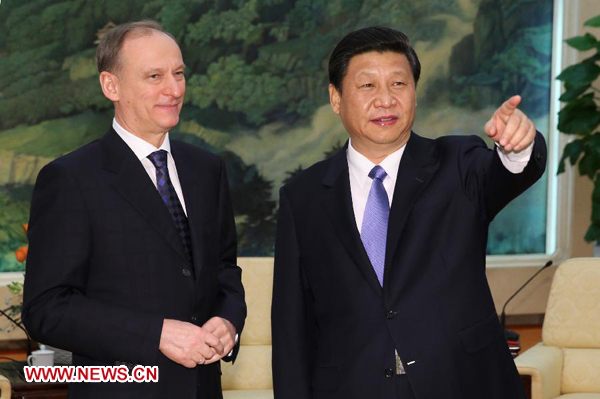  Xi Jinping (R), general secretary of the Communist Party of China Central Committee, meets with Russian Security Council Secretary Nikolai Patrushev in Beijing, capital of China, Jan. 8, 2013. [Xinhua photo]