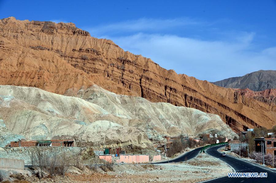 Photo taken on March 21, 2013 shows a scenic view of the Danxia Landform in Guide County of the Hainan Tibet Autonomous Prefecture, northwest China's Qinghai Province. 