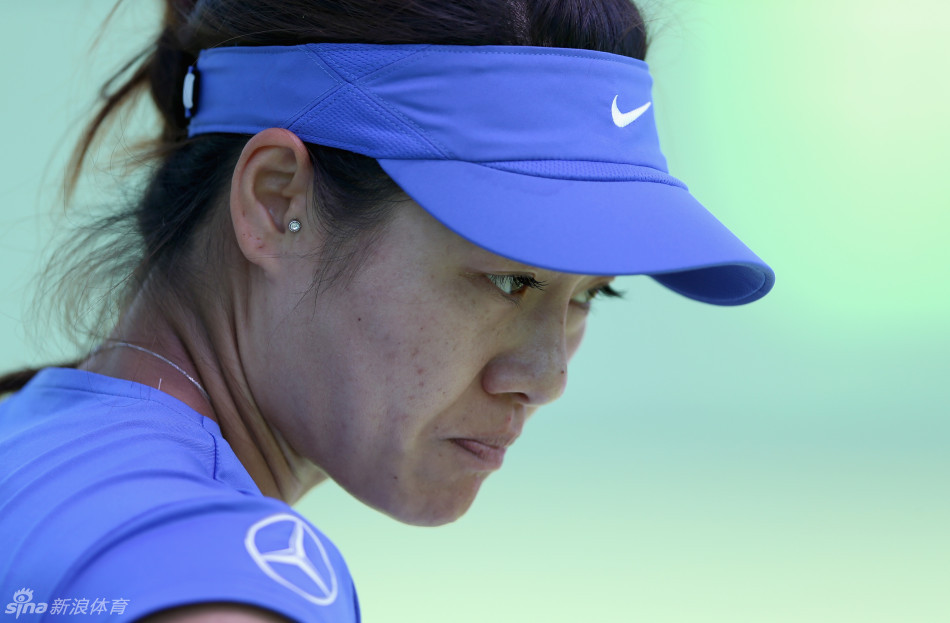 Li Na rests in the second-round opener at the Miami WTA and ATP Masters hardcourt tournament on March 21, 2013. 
