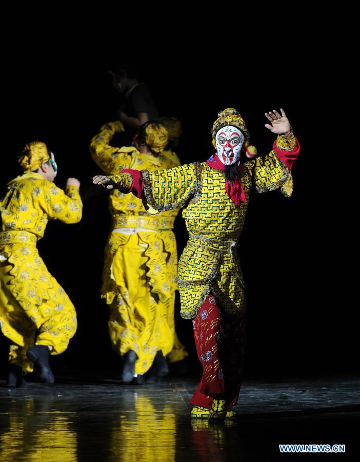 Artists perform during the opening ceremony of the 'Tourism Year of China' in Moscow, March 22, 2013. The 'China-Russia Tourism Year' program, which began last year with the 'Tourism Year of Russia' in China, aims to foster tourism ties and humanistic exchanges between the two countries. [Xinhua]