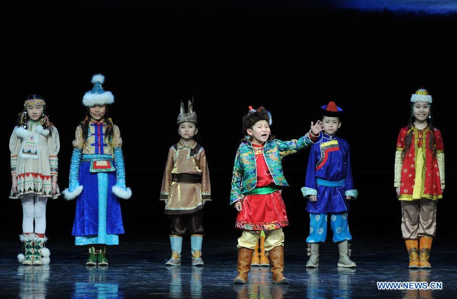 Artists perform during the opening ceremony of the 'Tourism Year of China' in Moscow, March 22, 2013. The 'China-Russia Tourism Year' program, which began last year with the 'Tourism Year of Russia' in China, aims to foster tourism ties and humanistic exchanges between the two countries. [Xinhua]