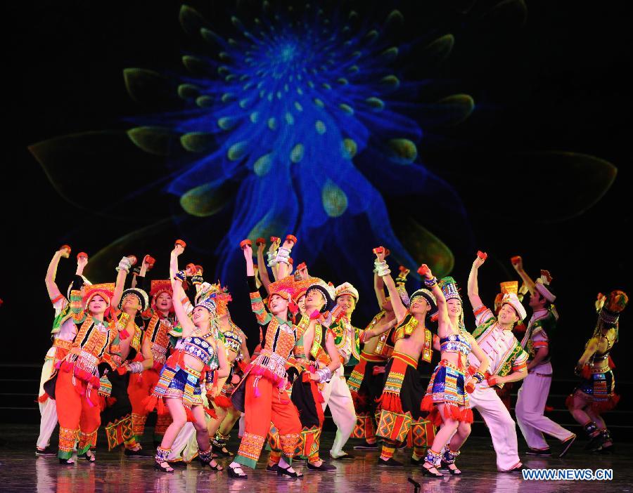 Artists perform during the opening ceremony of the 'Tourism Year of China' in Moscow, March 22, 2013. The 'China-Russia Tourism Year' program, which began last year with the 'Tourism Year of Russia' in China, aims to foster tourism ties and humanistic exchanges between the two countries. [Xinhua]