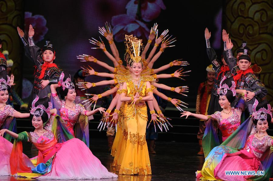 Artists perform during the opening ceremony of the 'Tourism Year of China' in Moscow, March 22, 2013. The 'China-Russia Tourism Year' program, which began last year with the 'Tourism Year of Russia' in China, aims to foster tourism ties and humanistic exchanges between the two countries. [Xinhua]