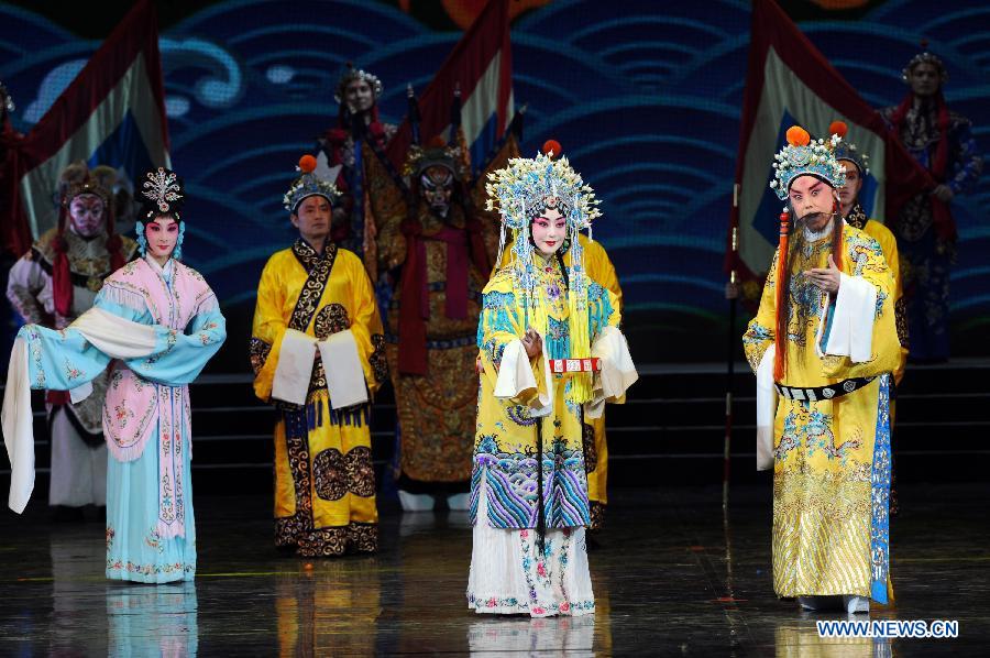 Artists perform during the opening ceremony of the 'Tourism Year of China' in Moscow, March 22, 2013. The 'China-Russia Tourism Year' program, which began last year with the 'Tourism Year of Russia' in China, aims to foster tourism ties and humanistic exchanges between the two countries. [Xinhua]