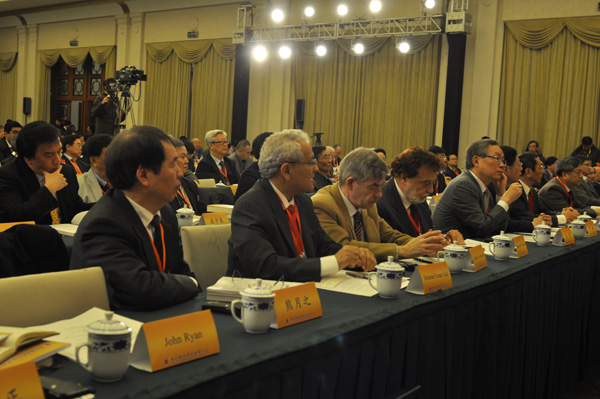 Scholars attend the opening ceremony of the Fifth World Forum on China Studies in Shanghai, March 23, 2013.