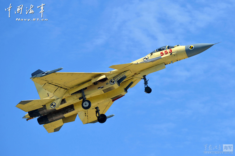 A PLA Navy&apos;s J-15 jet fighter practises take-off and landing on the country&apos;s first aircraft carrier, the Liaoning. [Photo / Navy.81.cn]