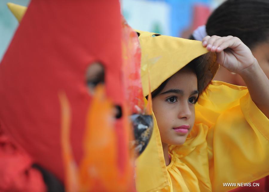 Children attend Holy Week Parade for Peace in Brazil