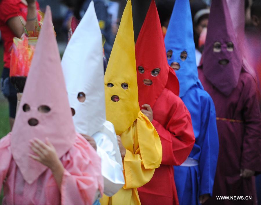 Children attend Holy Week Parade for Peace in Brazil