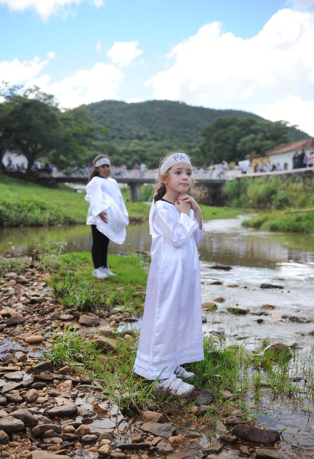 Children attend Holy Week Parade for Peace in Brazil