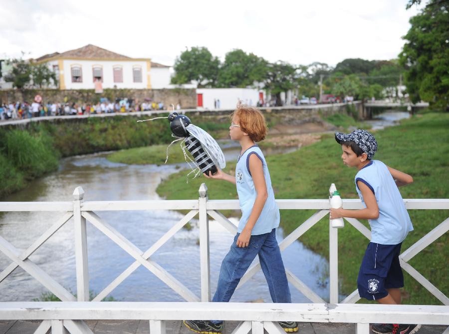 Children attend Holy Week Parade for Peace in Brazil