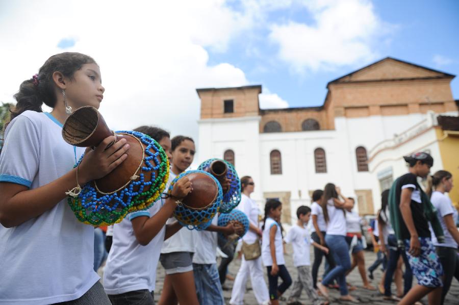 Children attend Holy Week Parade for Peace in Brazil