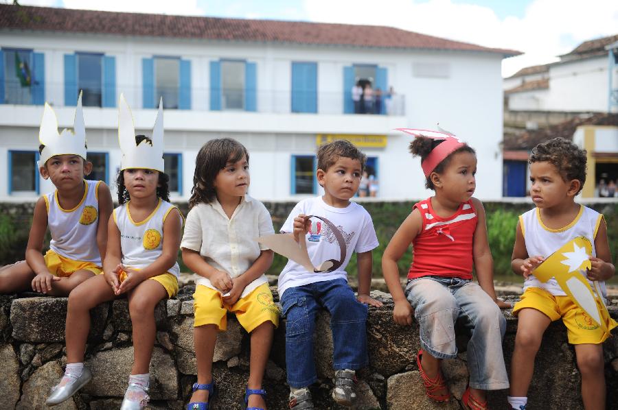 Children attend Holy Week Parade for Peace in Brazil