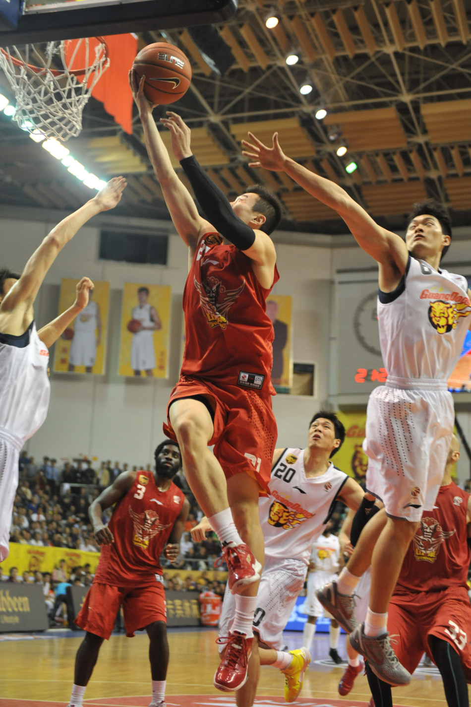 Shandong's Xu Jiahan goes up for a basket in Game 3 of CBA Finals on March 27, 2013. 