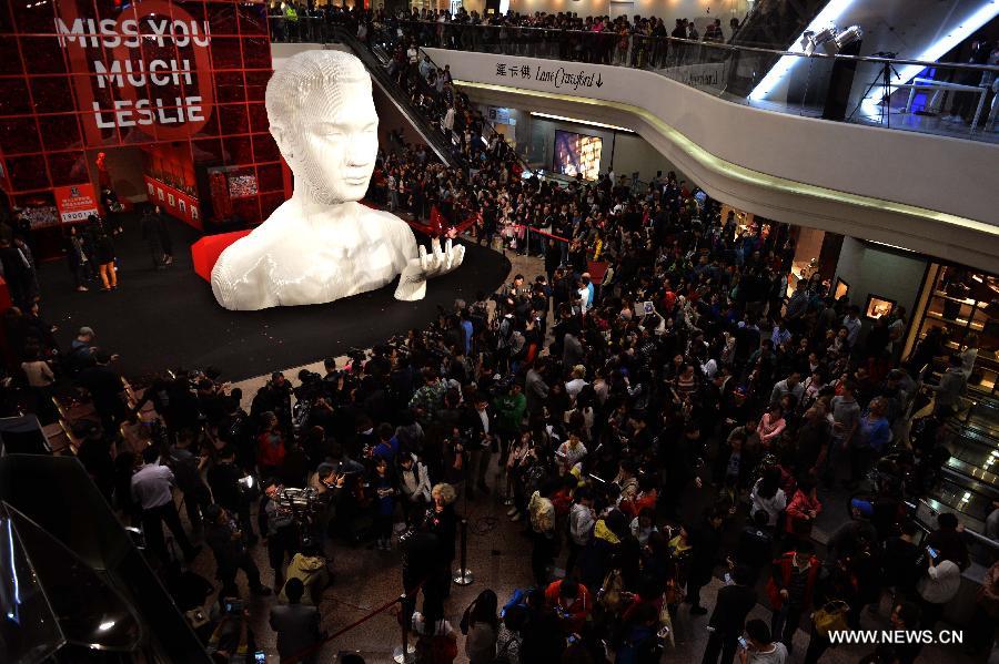 A five-metre-high sculpture of late Hong Kong singer Leslie Cheung is seen displayed at an exhibition for paying tribute to Cheung in Hong Kong, south China, March 30, 2013. The exhibition is held to mark the 10th anniversary of the death of Leslie Cheung, who leapt to his death from a hotel in Hong Kong on April 1, 2003. 