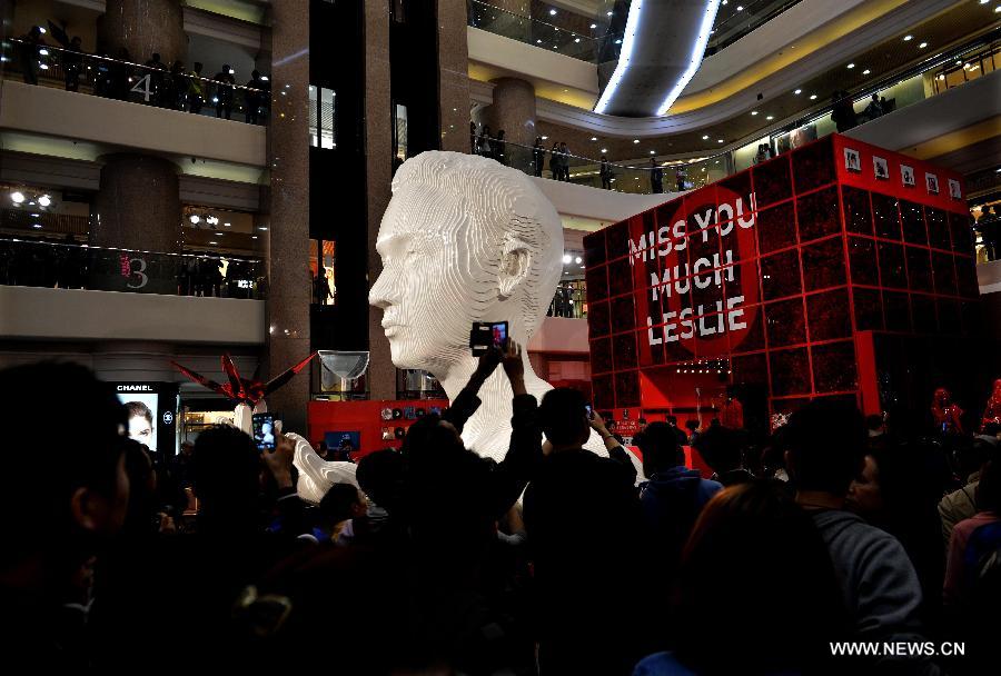 A five-metre-high sculpture of late Hong Kong singer Leslie Cheung is seen displayed at an exhibition for paying tribute to Cheung in Hong Kong, south China, March 30, 2013. The exhibition is held to mark the 10th anniversary of the death of Leslie Cheung, who leapt to his death from a hotel in Hong Kong on April 1, 2003. 