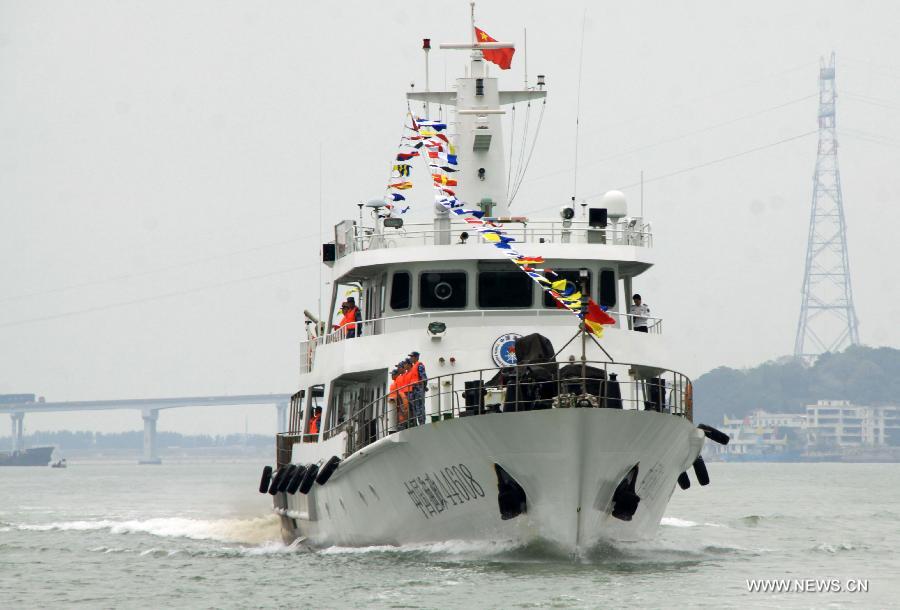 Chinese fishery patrol ship 44608 enters the bay in Shantou, south China's Guangdong Province, March 30, 2013. The patrol ship 44608 finished its 23-day patrol cruise around Huangyan Islands on Saturday and returned to Shantou. [Yao Jun/Xinhua]