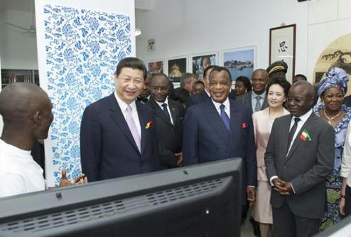 Chinese President Xi Jinping (L, front) and Denis Sassou Nguesso (R, front), the president of the Republic of Congo, attend the completion ceremony of the China-Republic of Congo Friendship Hospital project in Brazzaville, capital of the Republic of Congo, March 30, 2013. [Xinhua] 