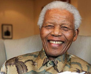 Mandela continues to receive treatment in hospital