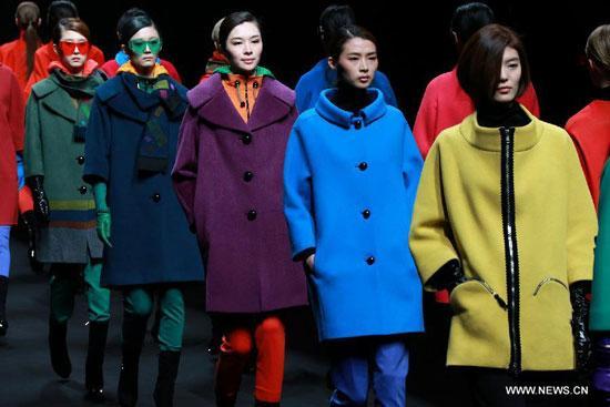 Models present creations at the Korean Designers' Collection show during the China Fashion Week (A/W 2013/2014) in Beijing, capital of China, March 29, 2013. 