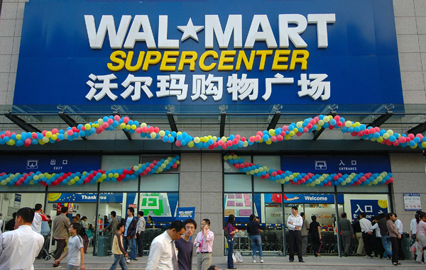 The world's largest retailer by sales will open 30 new stores in China and invest nearly 500 million yuan ($80.1 million) to remodel existing ones in the country. [File Photo]