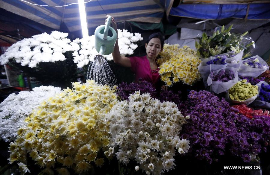 MYANMAR-YANGON-FLOWER-BUDDHA